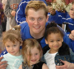 Head Coach Tomas Settell with a few of his younger athletes